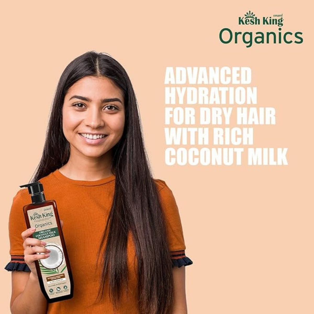 Refect Beauty woman holding Kesh King Organics coconut milk shampoo bottle for dry hair hydration