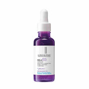 Refect Beauty La Roche-Posay Mela B3 Intensive Concentrate Serum in a purple glass bottle with a white dropper cap.