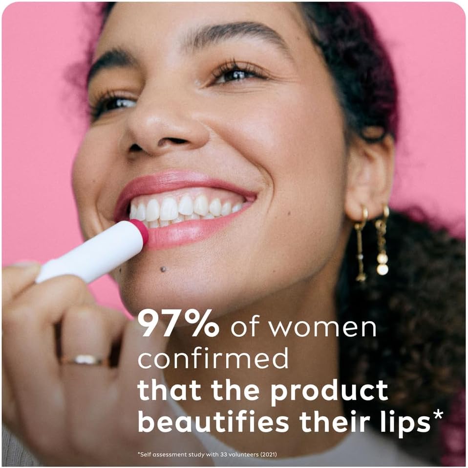 Refect Beauty model applying Labello Shine Cherry lip balm for a glossy, hydrated, and natural pink tint