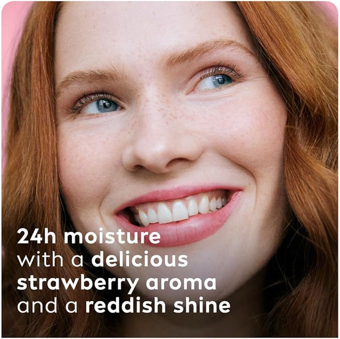 Refect Beauty Labello Strawberry Shine lip balm providing glossy reddish tint and hydration on a smiling woman