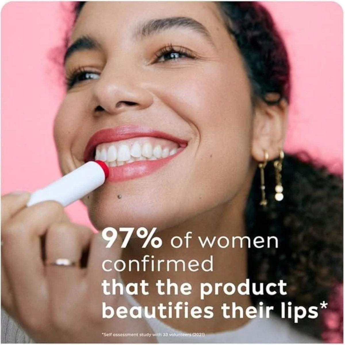 Refect Beauty Labello Strawberry Shine lip balm applied by a smiling woman for a glossy, hydrated finish