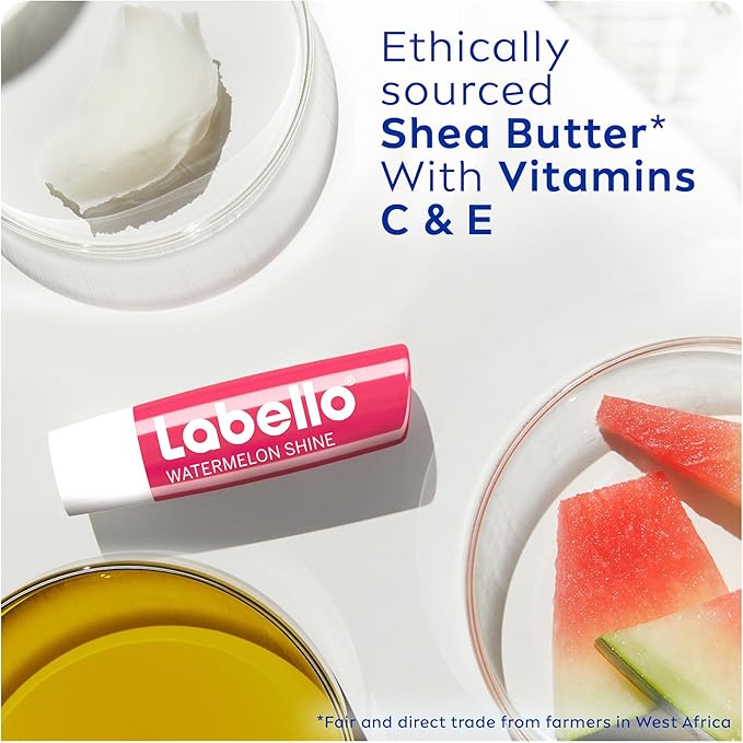 Refect Beauty Labello Watermelon Shine lip balm with shea butter and vitamins C and E on a white surface with fruit