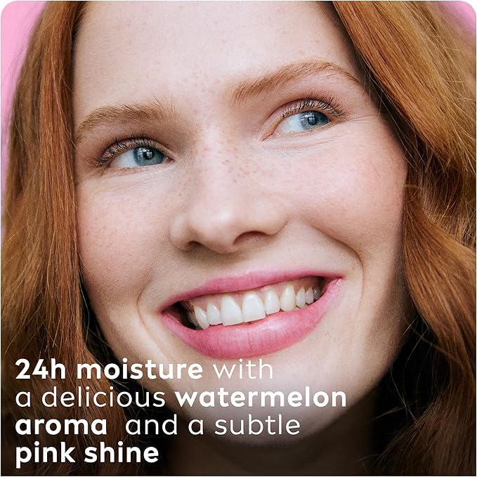 Refect Beauty Labello Watermelon Shine lip balm applied on a smiling woman with red hair for a glossy pink finish