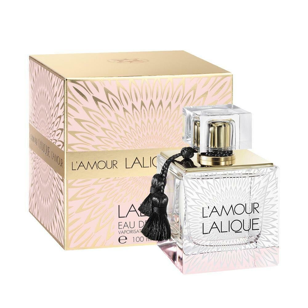 Refect Beauty Lalique L'Amour Eau de Parfum bottle with gold cap and black tassel next to its elegant patterned box.