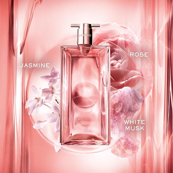 Refect Beauty Lancôme Idôle Eau de Parfum bottle surrounded by rose, jasmine, and white musk floral fragrance notes.