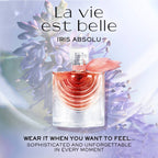 Refect Beauty Lancome La Vie Est Belle Iris Absolu perfume bottle with a pink ribbon against a purple iris background.