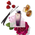 Refect Beauty Lancome Tresor Midnight Rose perfume bottle surrounded by fresh raspberries, vanilla, and pink roses.
