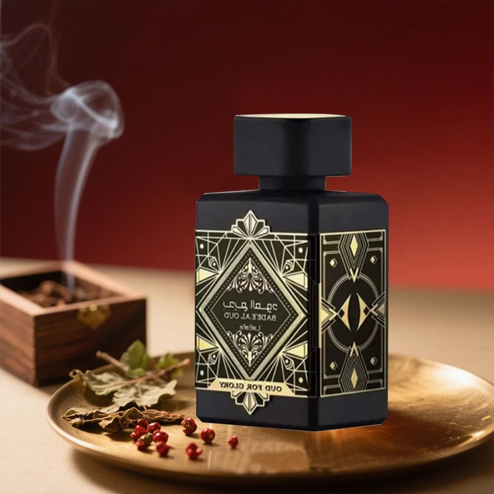 Refect Beauty Lattafa Bade’e Al Oud Oud for Glory perfume bottle with gold geometric art deco design on a gold tray