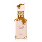 Refect Beauty Lattafa Eclaire Eau de Parfum in a pale pink bottle with elegant gold dripping accents