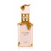 Refect Beauty Lattafa Eclaire Eau de Parfum in a pale pink bottle with elegant gold dripping accents