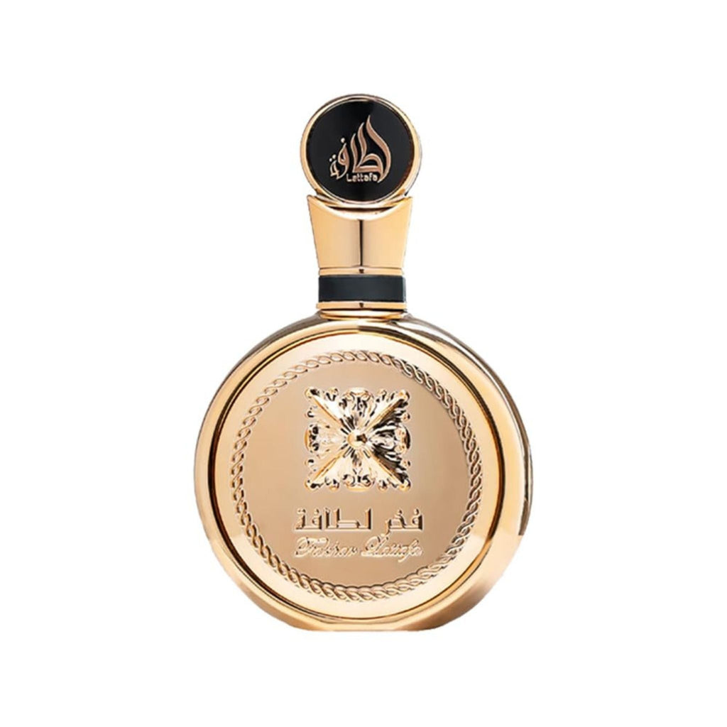 Refect Beauty Lattafa Fakhar Lattafa Extrait perfume bottle in a round gold design with ornate embossed detailing.