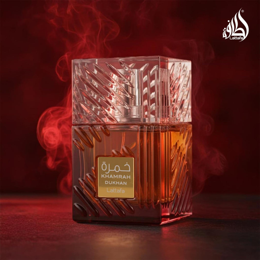 Refect Beauty Lattafa Khamrah Dukhan Eau de Parfum in a textured glass bottle surrounded by dramatic red smoke