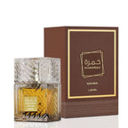 Refect Beauty Lattafa Khamrah Qahwa Eau de Parfum bottle with textured glass next to its brown and gold box.