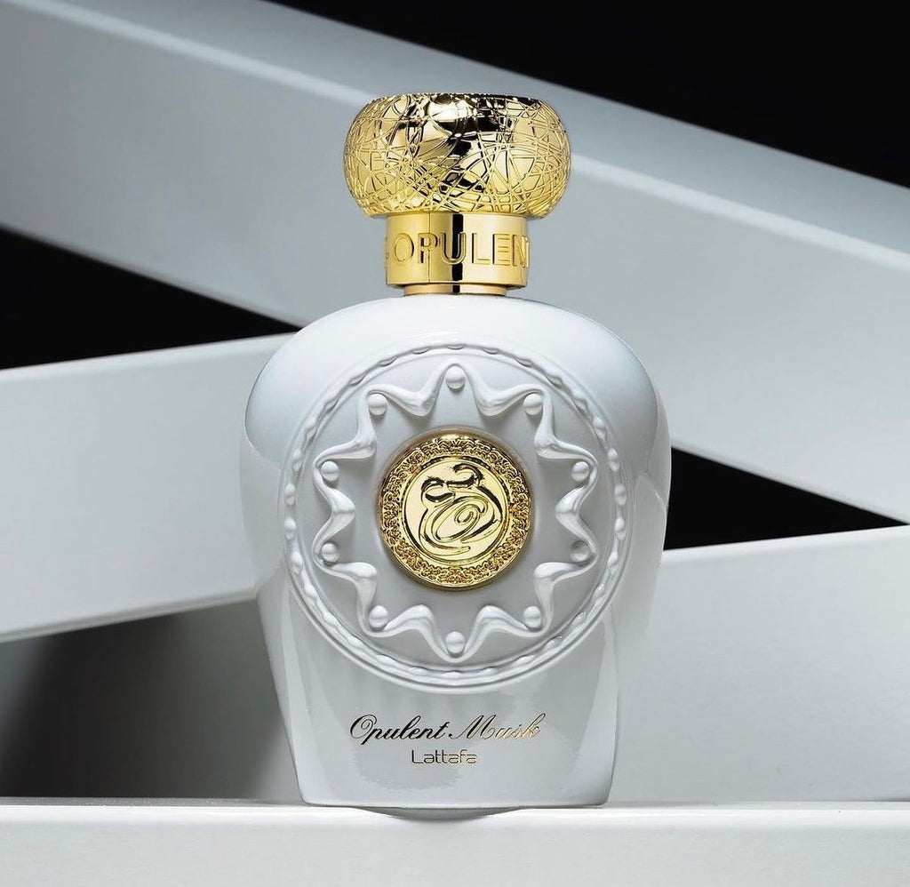 Refect Beauty Lattafa Opulent Musk Eau de Parfum in a white bottle with gold cap and ornate circular emblem