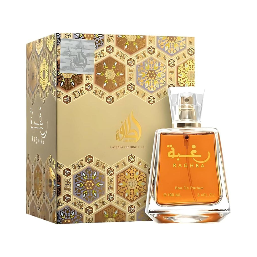 Refect Beauty Lattafa Raghba Eau de Parfum bottle with gold hexagonal patterned box, a warm unisex oriental fragrance.