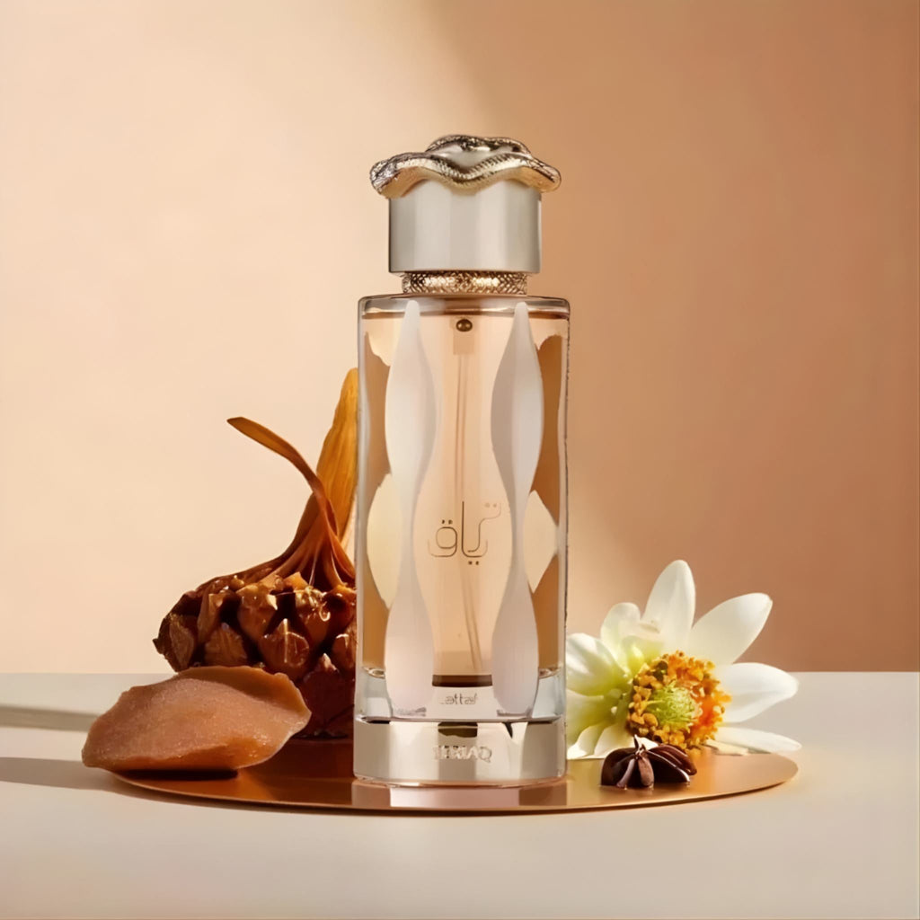 Refect Beauty Lattafa Teriq Eau de Parfum bottle with floral and woody accents on a gold base