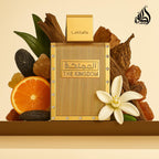 Refect Beauty Lattafa The Kingdom Eau de Parfum in a gold bottle surrounded by orange slices, flowers, and amber.