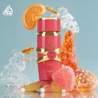 Refect Beauty Lattafa Yara Candy Eau de Parfum in a pink bottle surrounded by candy, fruit slices, and sugar crystals.