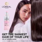 Refect Beauty L'Oréal Paris Elvive Glycolic Gloss Leave-In Serum bottle next to a woman with long, shiny dark hair.