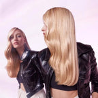 Refect Beauty model with long, shiny blonde hair wearing a black jacket, promoting L'Oreal Paris Elvive shampoo.