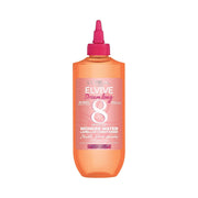 Refect Beauty L'Oreal Paris Elvive Dream Long Wonder Water lamellar hair treatment in an orange bottle with pink cap.