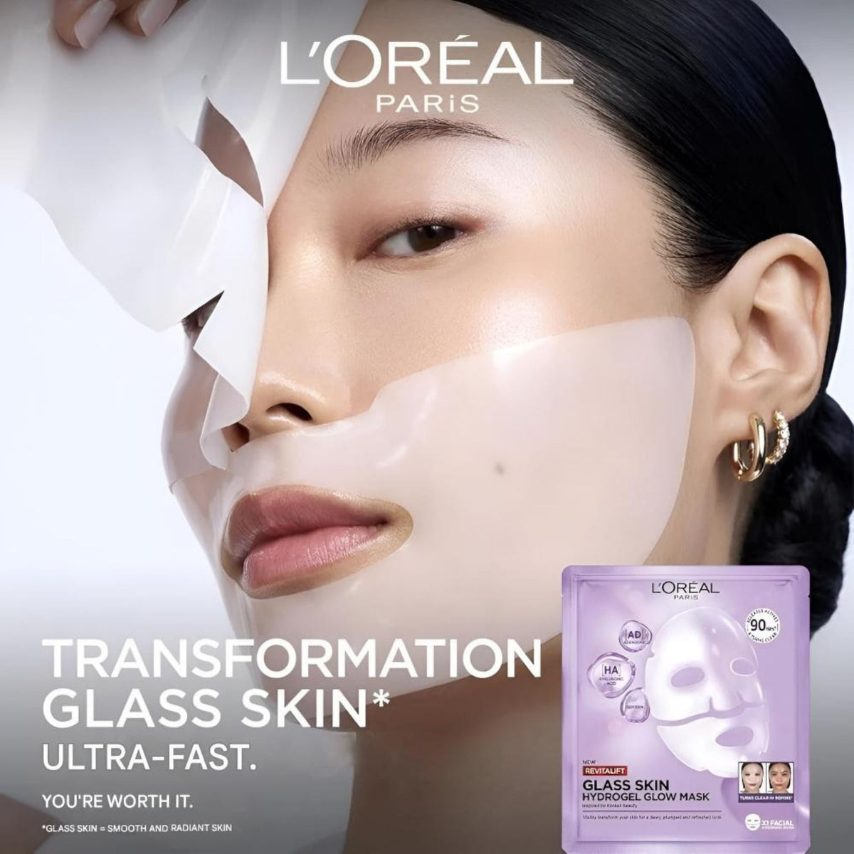 Refect Beauty model applying L'Oréal Paris Revitalift Filler hydrogel sheet mask for a radiant glass skin glow.