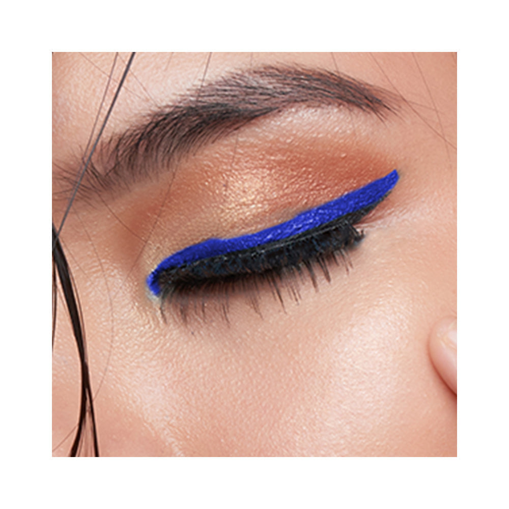 Refect Beauty LUNA Eye Liner Pencil applied as a bold, vibrant blue winged eyeliner on a model's eyelid.