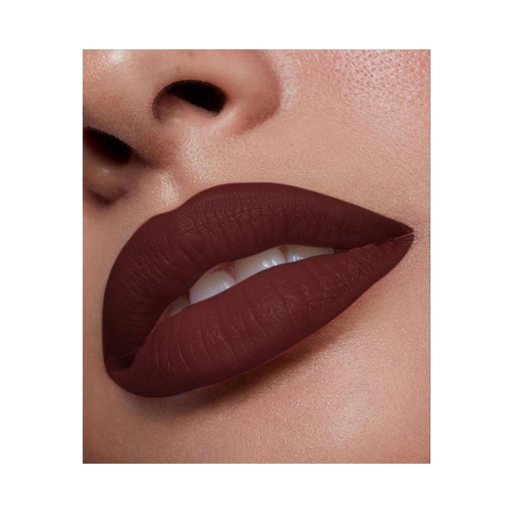 Refect Beauty LUNA semi matte lipstick in a deep dark brown shade applied on lips for a smooth, rich finish.