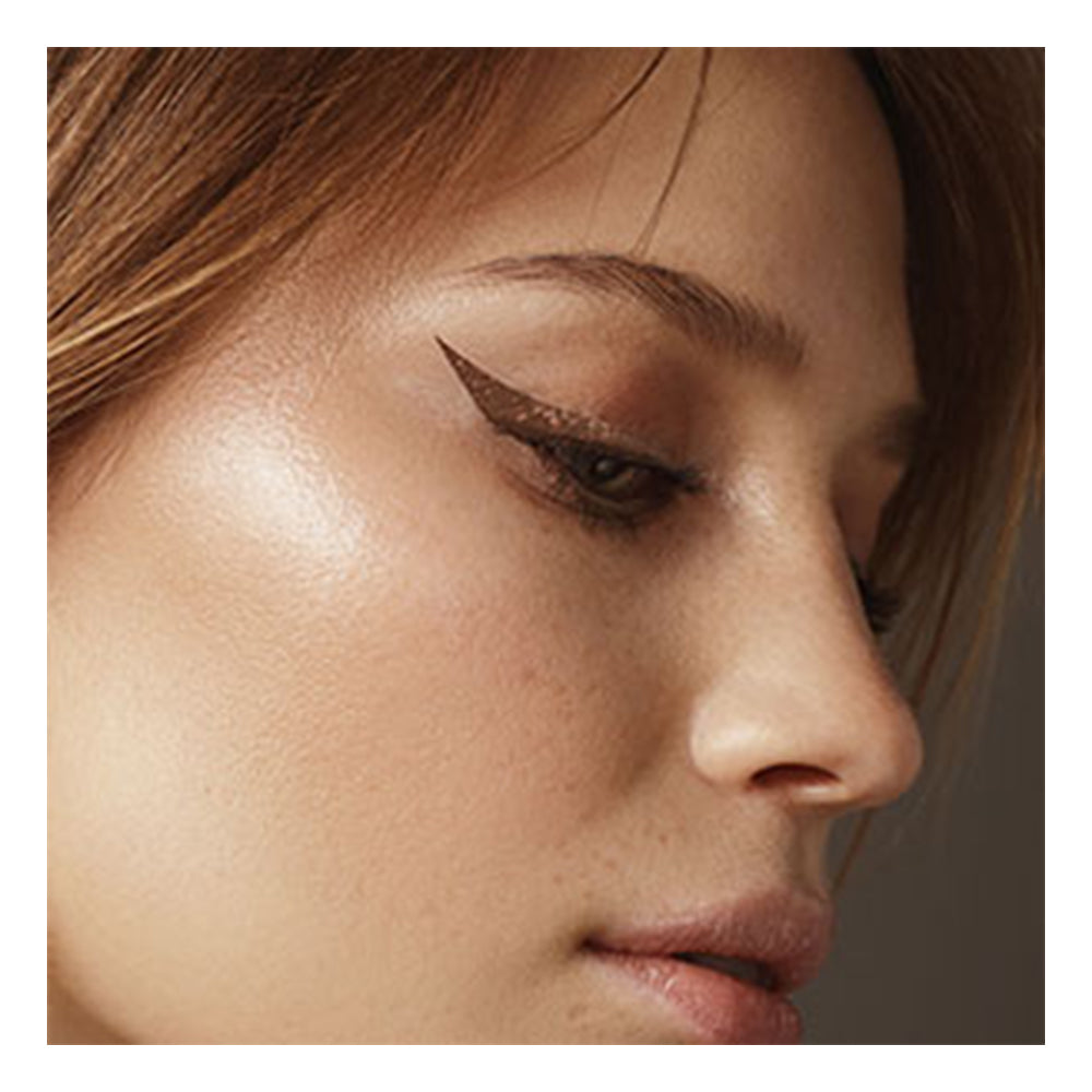 Refect Beauty LUNA Dip Liner liquid eyeliner applied in a sharp, precise winged style on a model's eyelid