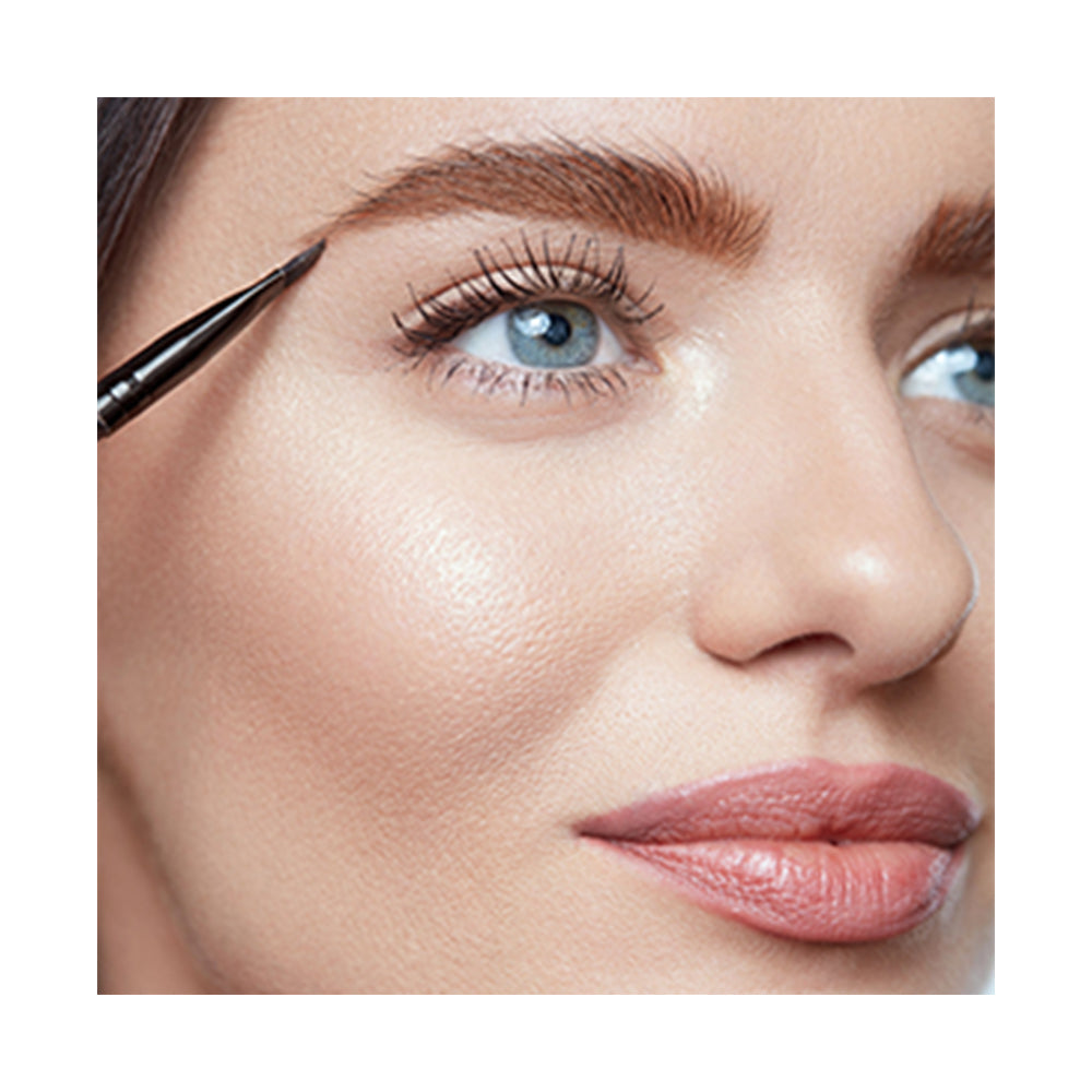Refect Beauty LUNA Eye Brow Powder being applied with an angled brush for defined, natural-looking eyebrows.