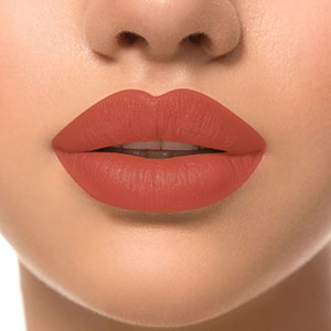 Refect Beauty LUNA Lipstick 7/11 in a warm terracotta shade with a smooth, matte finish applied on lips.