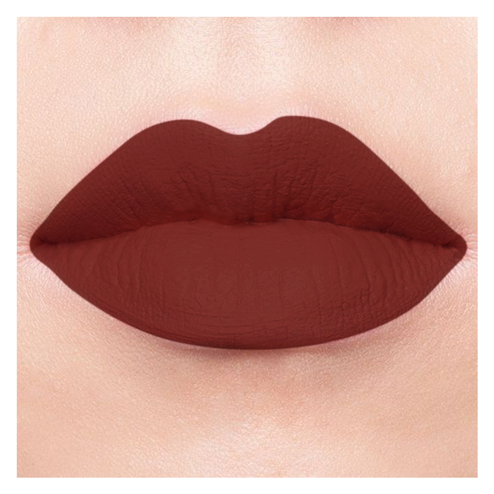 Refect Beauty Luna Matte Lipstick in a deep brick red shade with a smooth, long-lasting matte finish on lips.