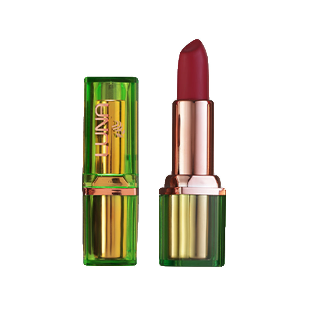 Refect Beauty Luna Matte Lipstick in a deep red shade with a unique translucent green and gold metallic case.