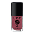 Refect Beauty Luna Nail Lacquer in a dusty rose shade with a high-gloss, long-lasting formula in a glass bottle.