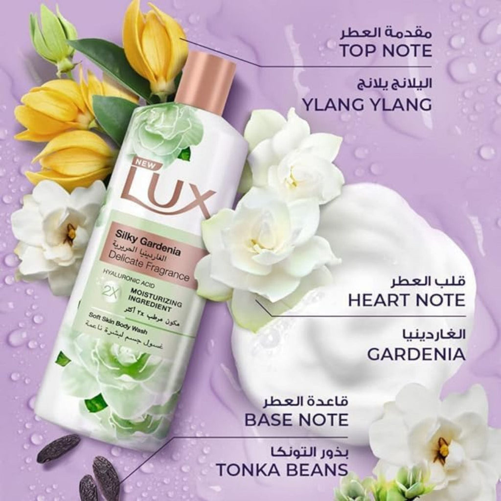 Refect Beauty Lux Silky Gardenia body wash bottle surrounded by gardenia flowers, ylang ylang, and creamy lather