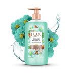 Refect Beauty Lux Purifying Watermint and Almond Oil hand wash in a pump bottle with mint green liquid and floral decor