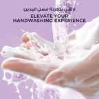 Refect Beauty Lux Purifying Watermint hand wash creating a rich, cleansing lather on hands against a purple background.