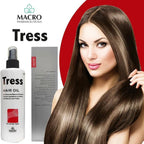 Refect Beauty Macro Tress hair oil bottle next to a woman with long, healthy, shiny brown hair.