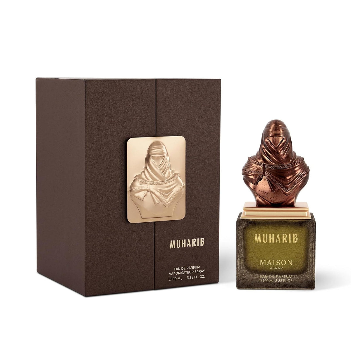 Refect Beauty Maison Asrar Muharib Eau de Parfum bottle with a bronze warrior bust cap next to its matching box
