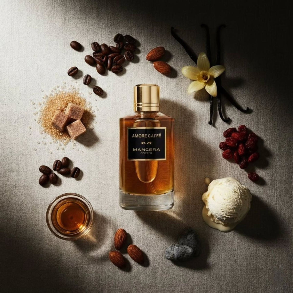 Refect Beauty Mancera Amore Caffè perfume bottle surrounded by coffee beans, vanilla, brown sugar, and gelato.