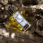 Refect Beauty Mancera Cedrat Boise Eau de Parfum 120ml bottle resting on textured natural driftwood
