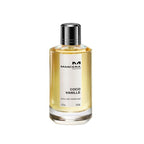 Refect Beauty Mancera Coco Vanille Eau de Parfum in a clear glass bottle with a silver cap and golden fragrance liquid