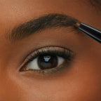 Refect Beauty Maybelline Express Brow Duo pencil defining and shaping a natural eyebrow on a person with dark skin