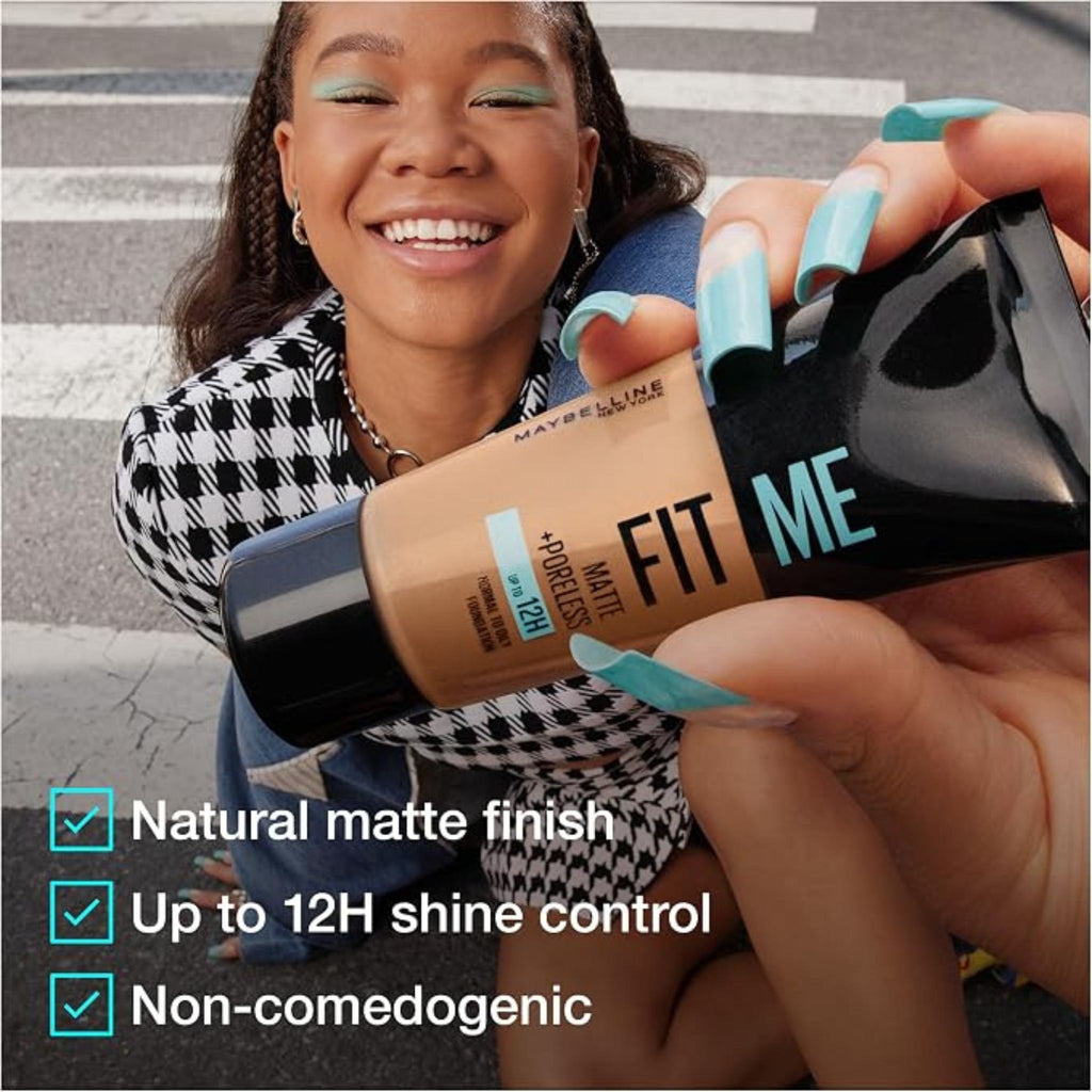 Refect Beauty Maybelline Fit Me Matte Poreless Foundation held by a smiling woman with matching blue nails