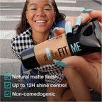 Refect Beauty Maybelline Fit Me Matte Poreless Foundation held by a smiling woman with matching blue nails