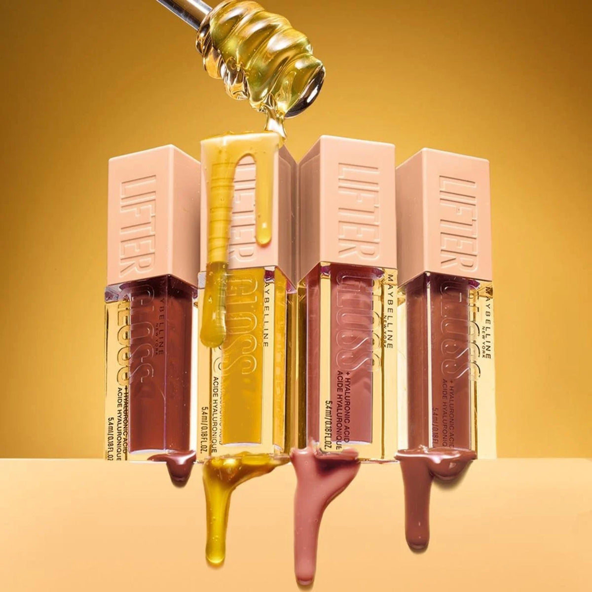 Refect Beauty Maybelline Lifter Gloss collection with hyaluronic acid showing glossy shades and honey-like texture