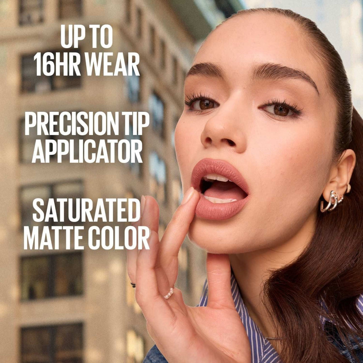 Refect Beauty model wearing Maybelline Super Stay Matte Ink liquid lipstick in a soft nude shade with a matte finish