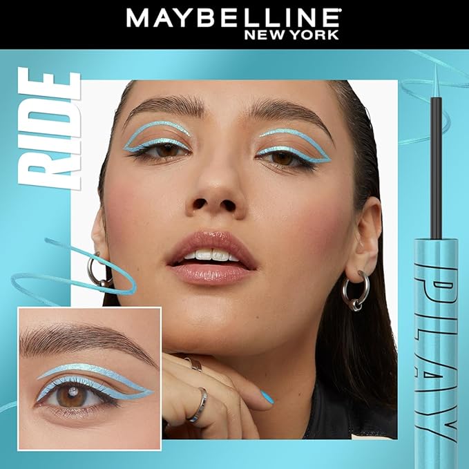 Refect Beauty model wearing metallic light blue Maybelline Tattoo Liner Play with a precise winged graphic eye look