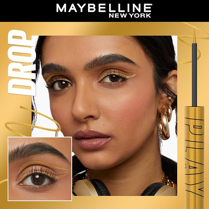 Refect Beauty Maybelline Tattoo Liner Play in metallic gold applied as a precise winged eyeliner on a model