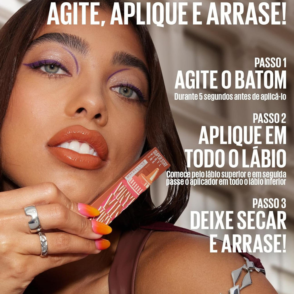 Refect Beauty model wearing Maybelline Super Stay Vinyl Ink Sauce liquid lipstick with a glossy, high-shine finish.